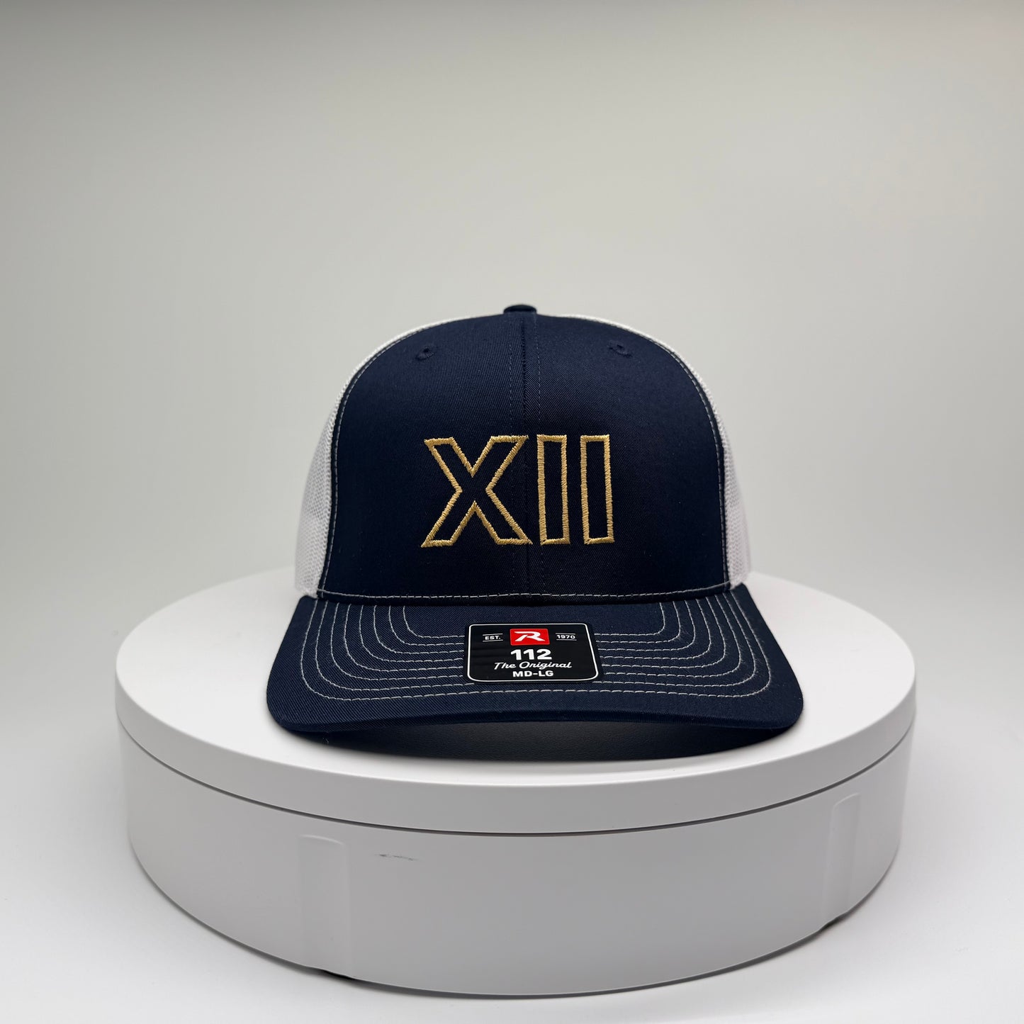 XII