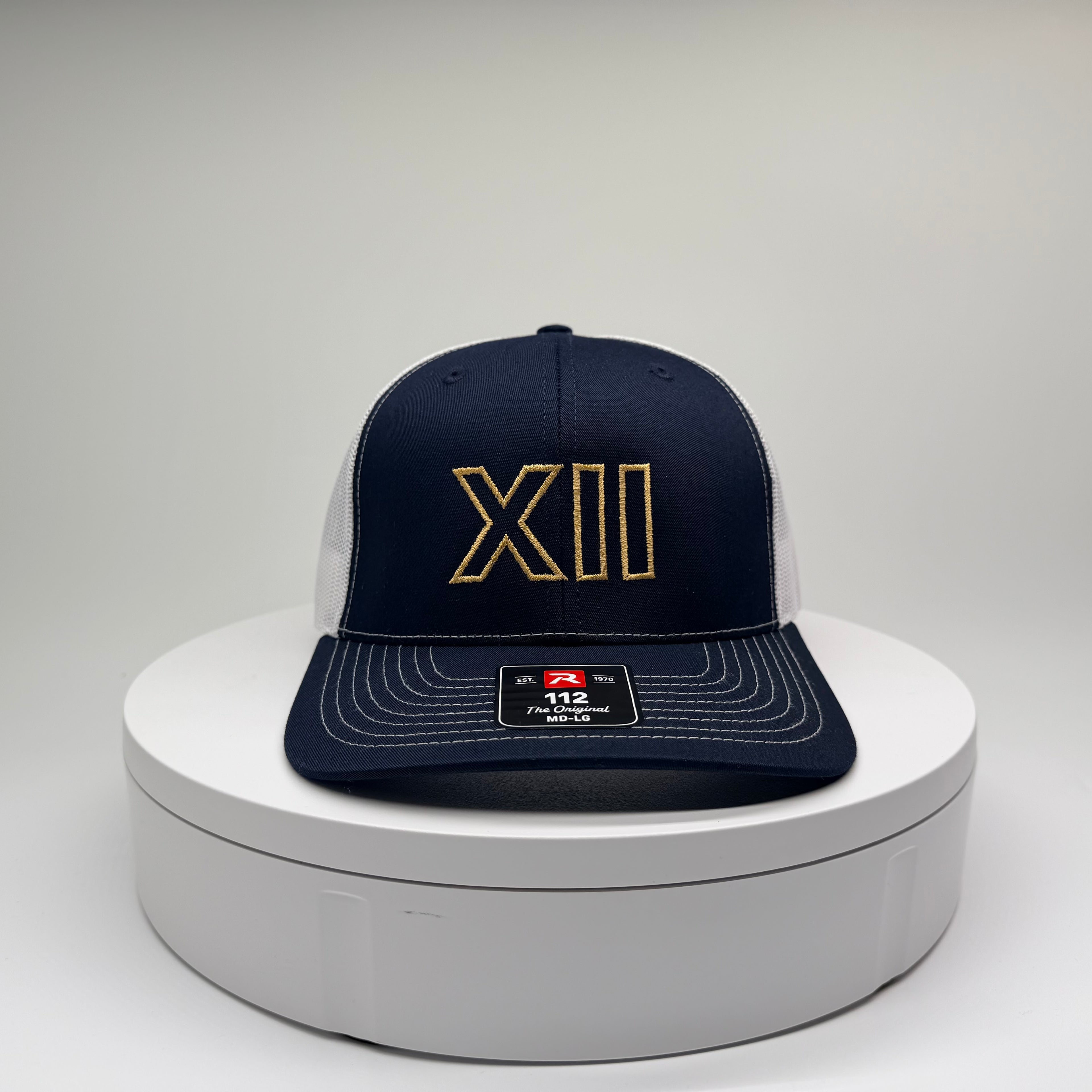 XII