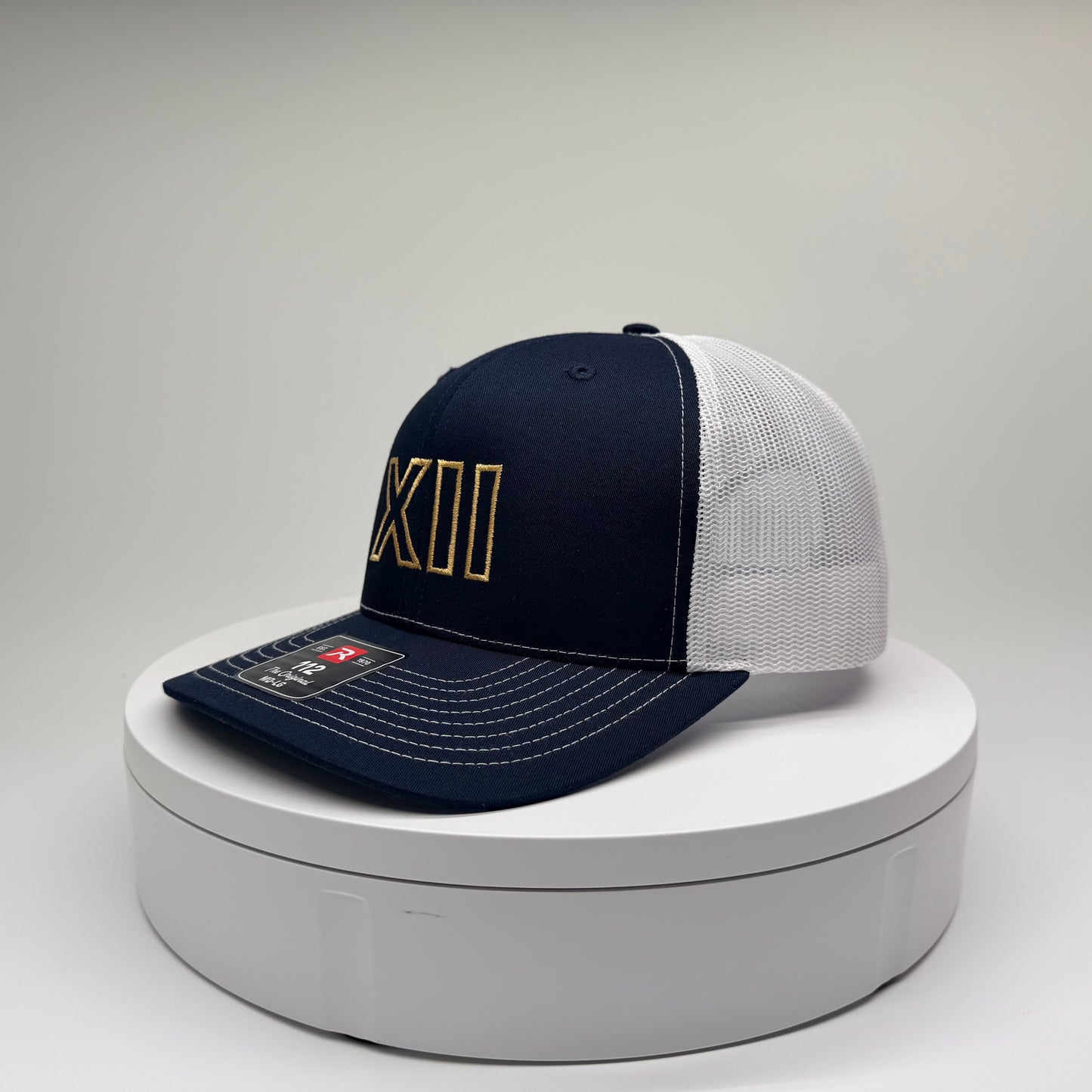 XII