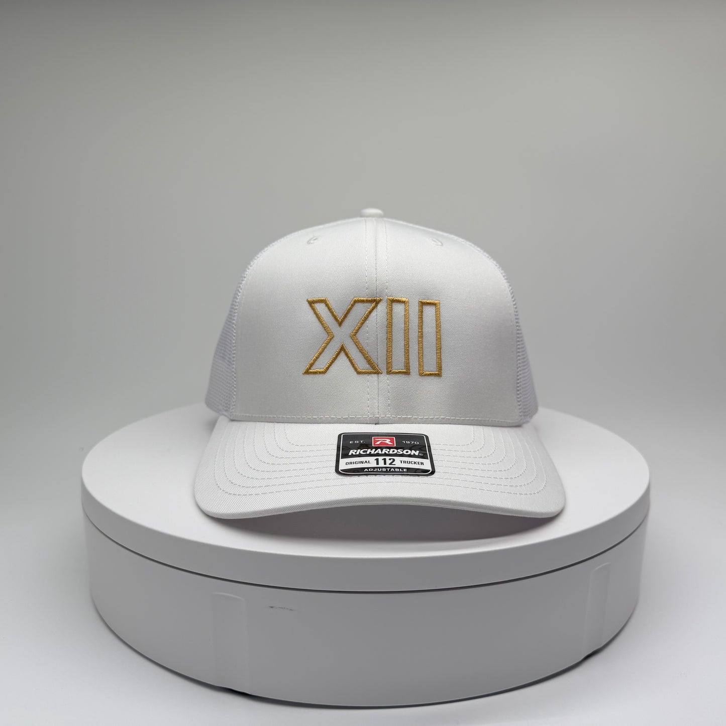 XII