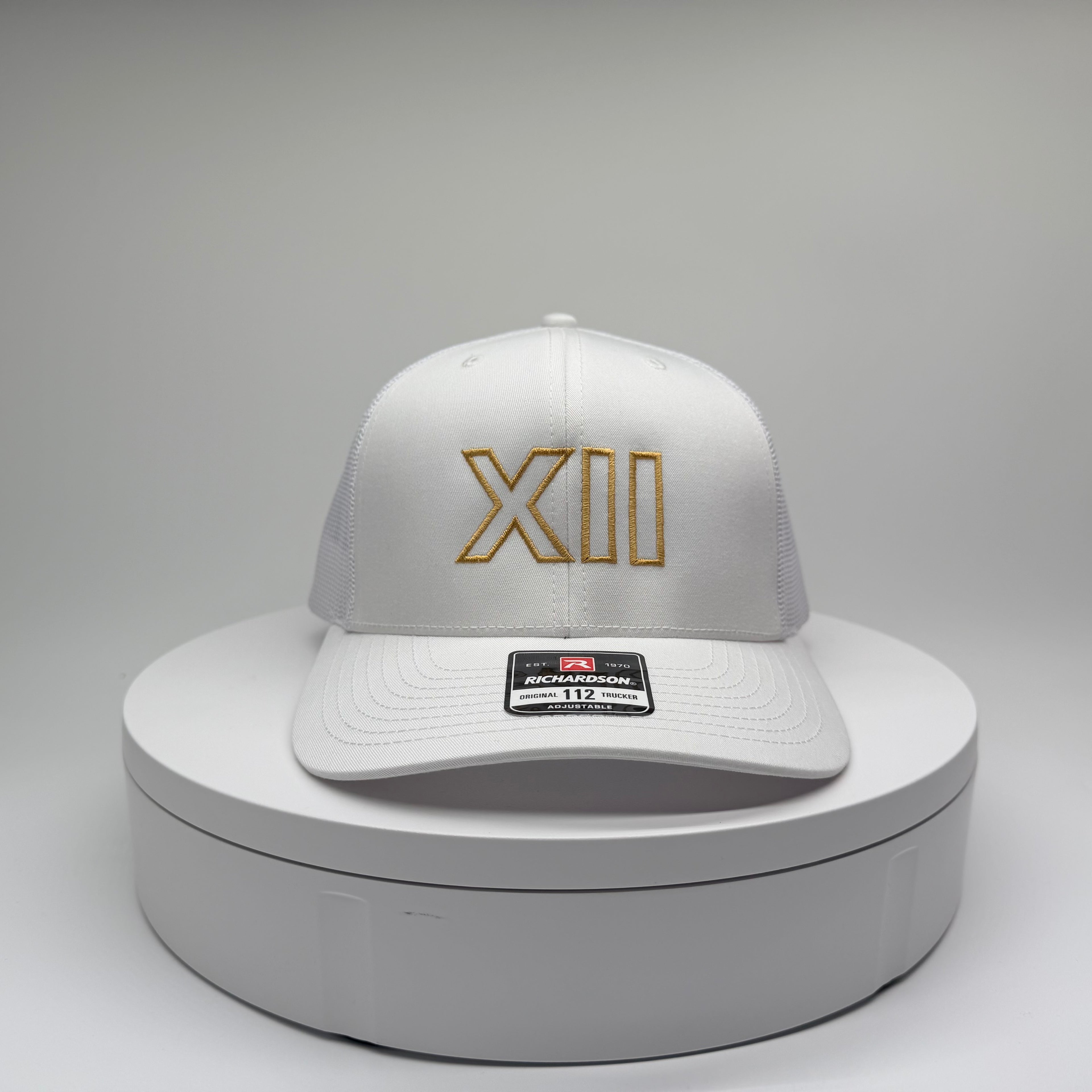 XII