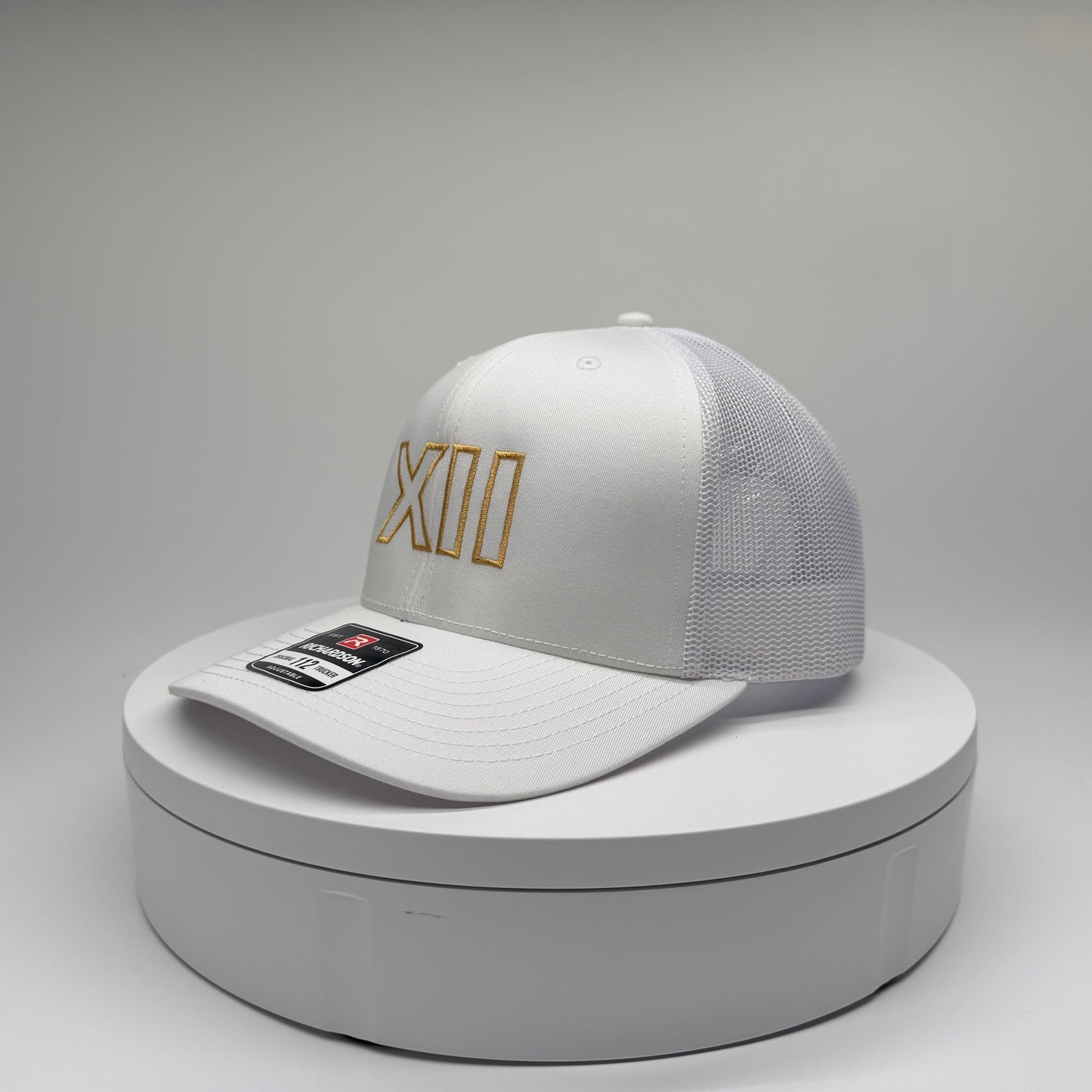 XII