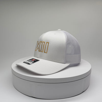 XII
