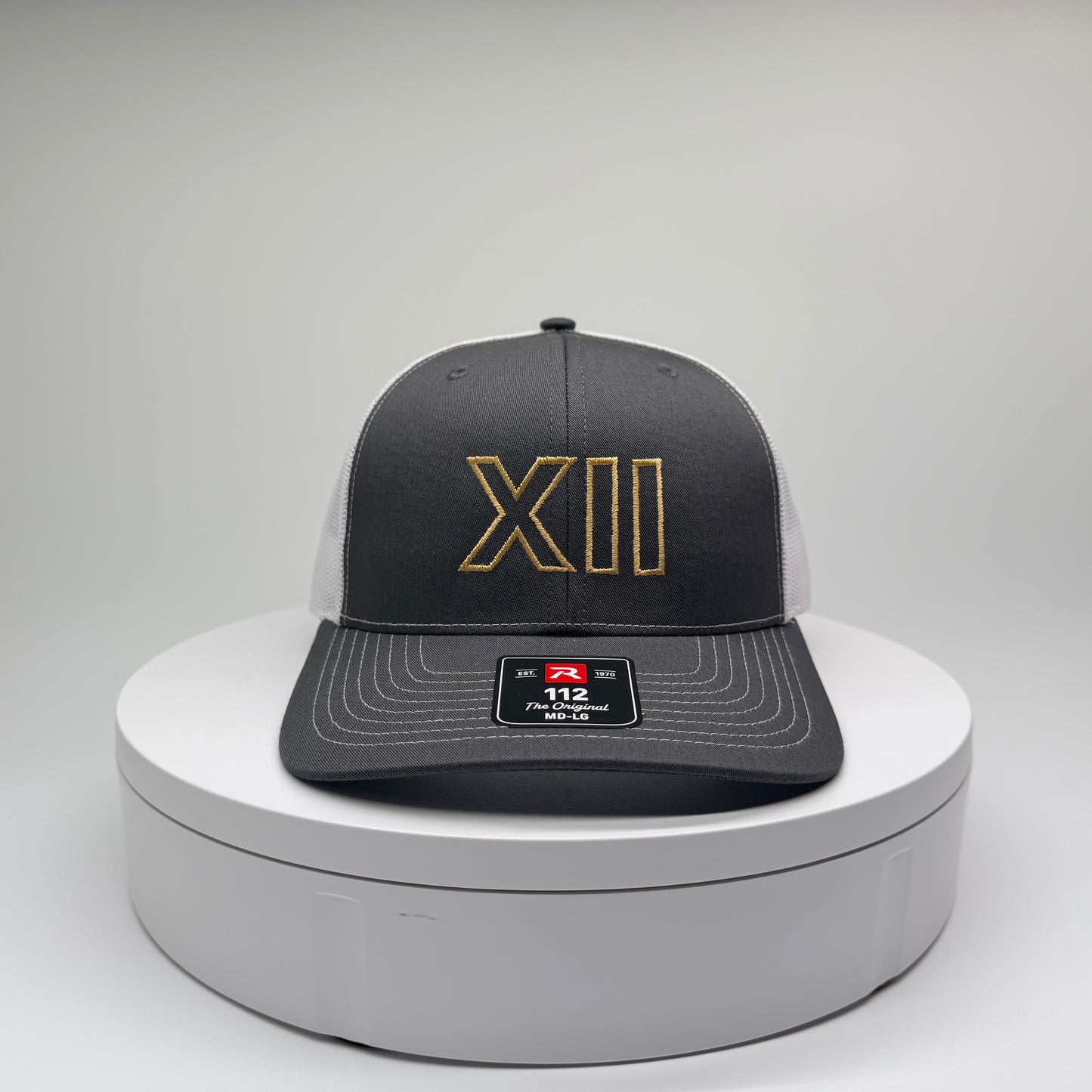 XII