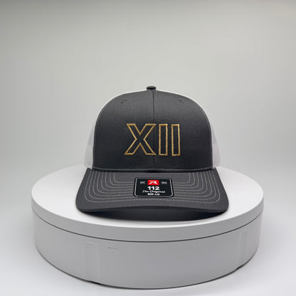 XII
