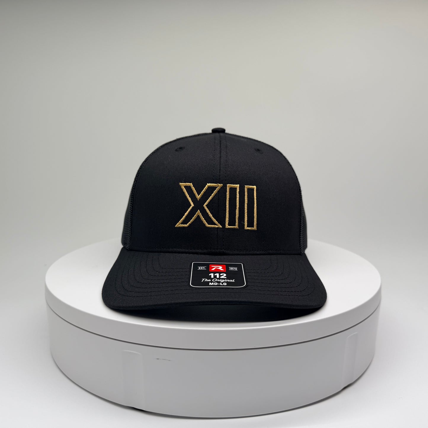 XII
