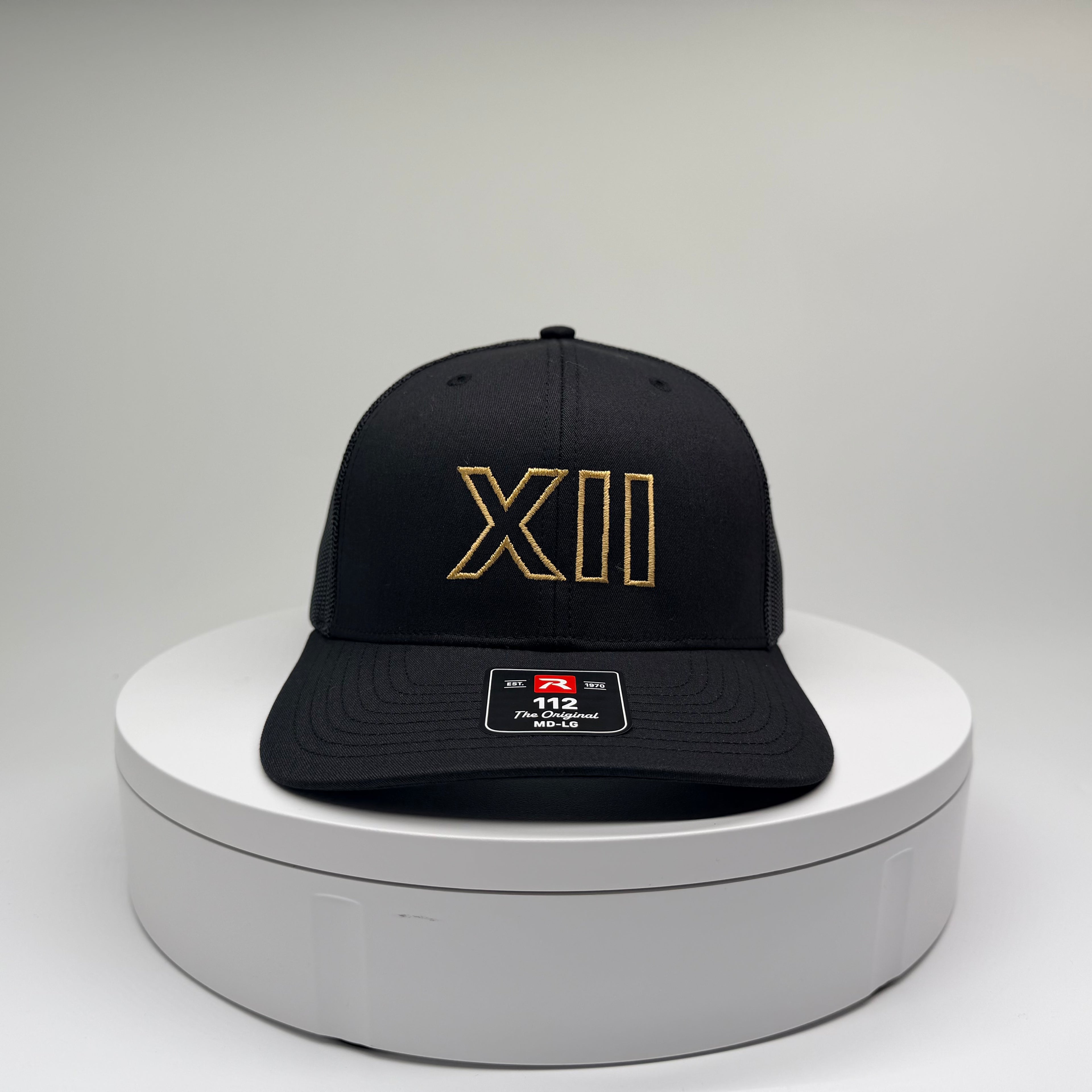 XII