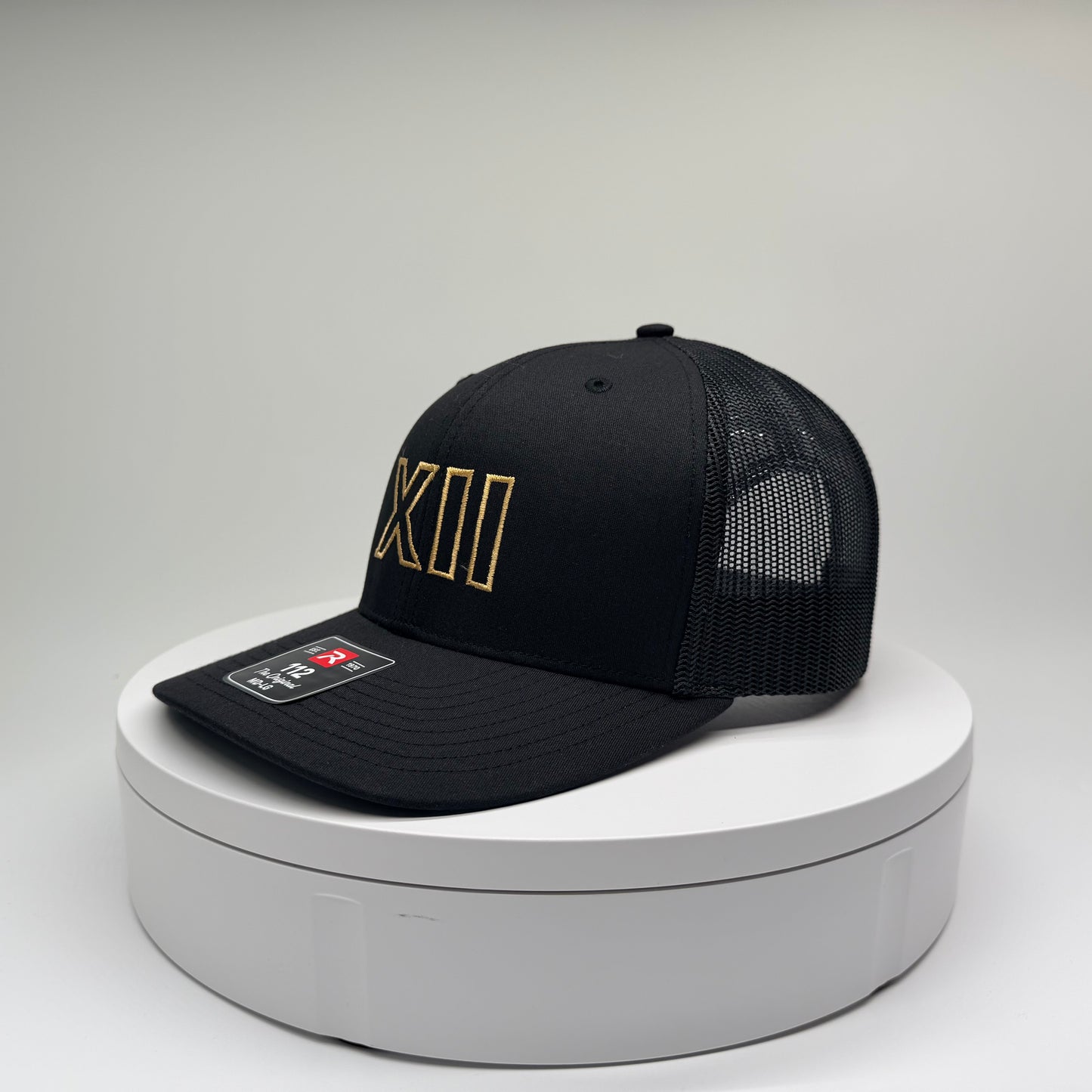 XII