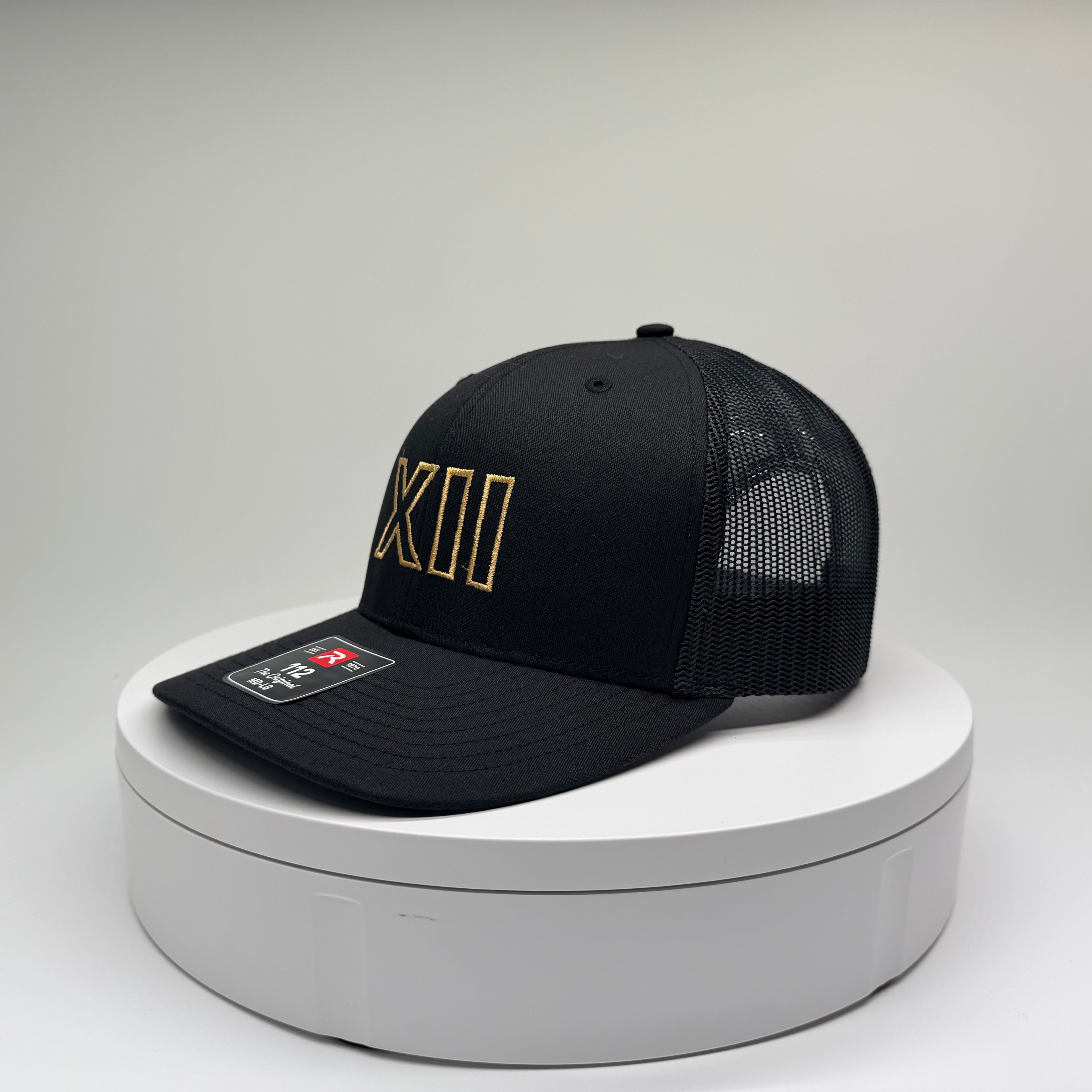 XII